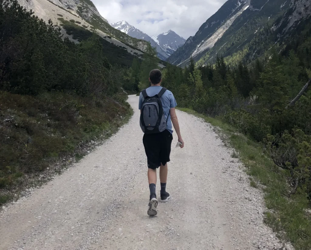 Rob walking a mountain path