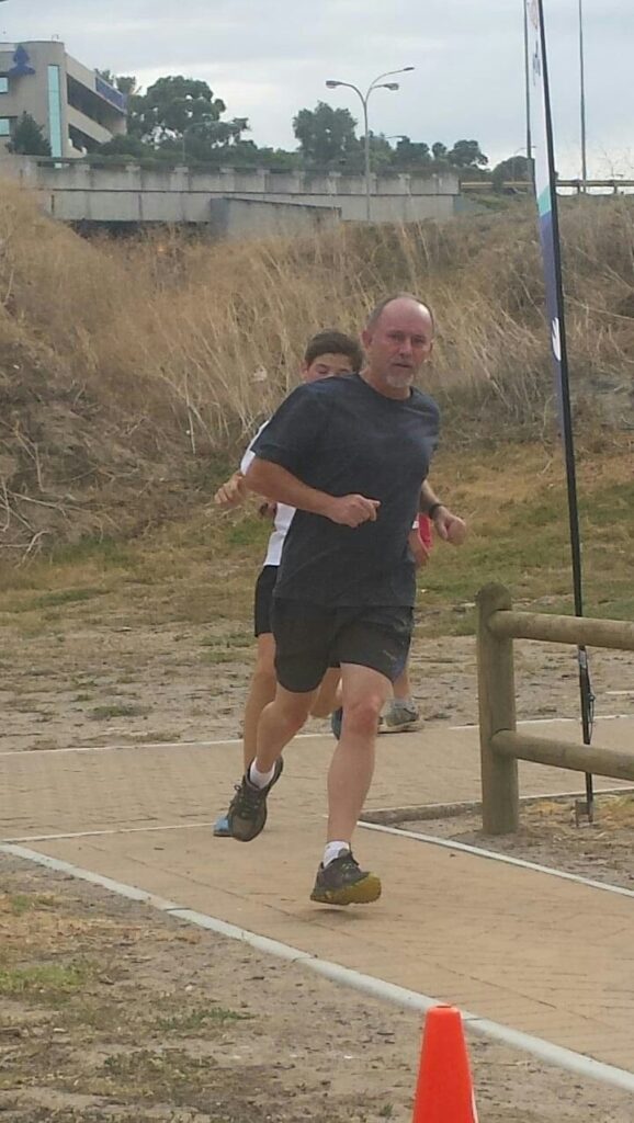 Photo of Colin jogging.