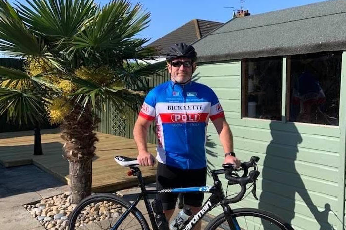 Man holding a bike